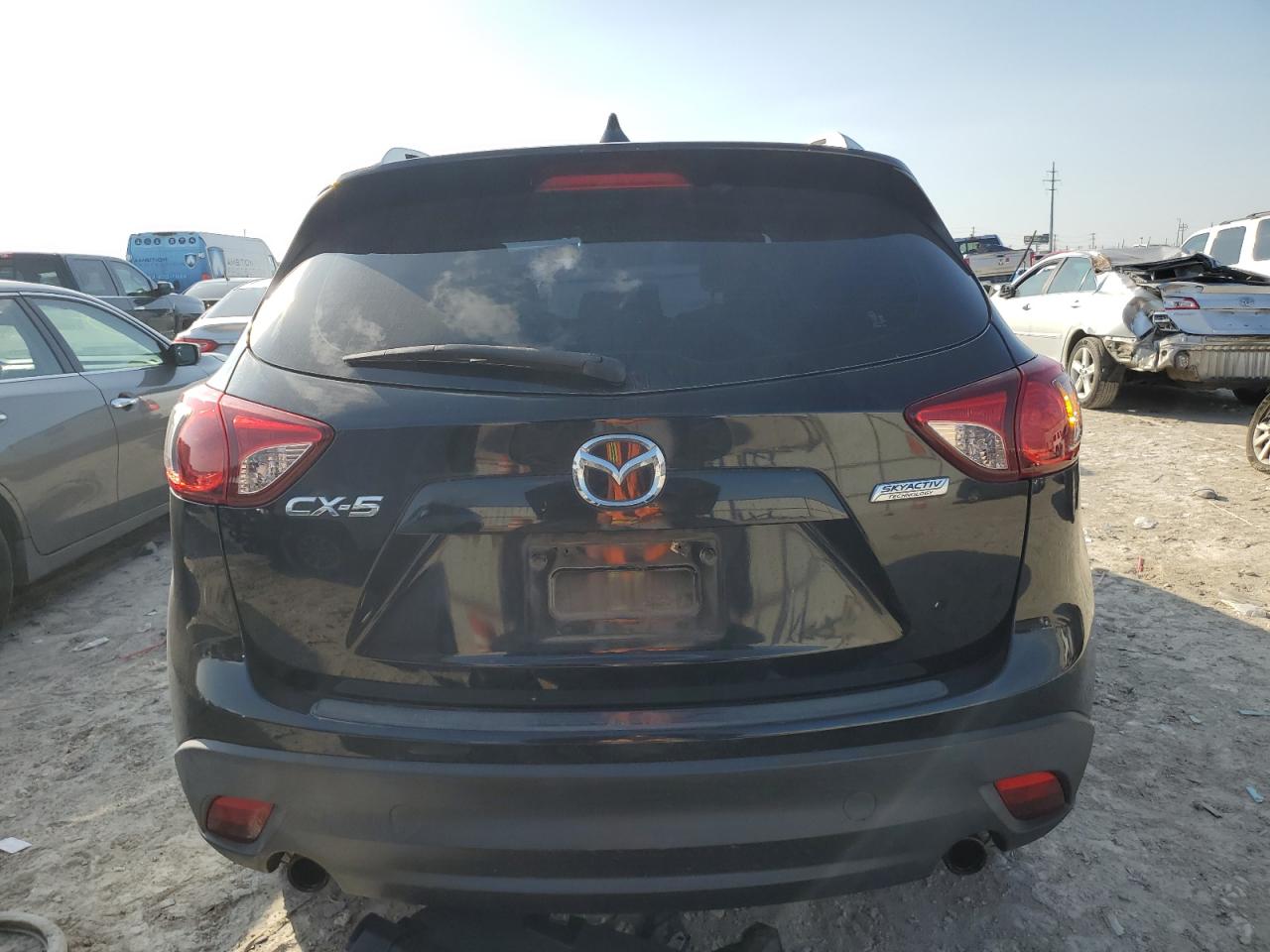 2014 Mazda CX-5 VIN JM3KE2BE0E0319007 Copart auction photo, front end / minor dent/scratches damage thumbnail 6