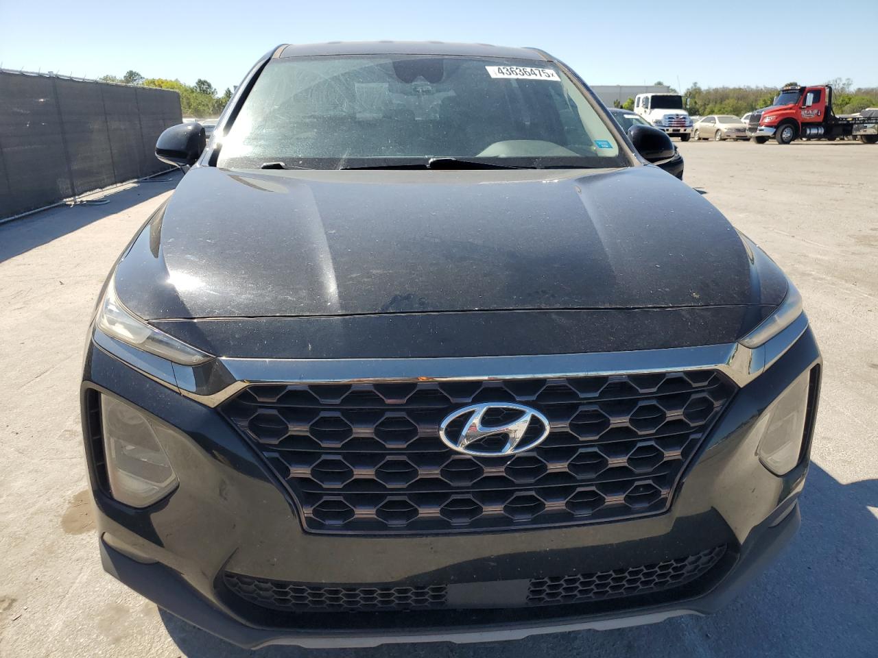 2019 Hyundai Santa Fe VIN 5NMS33AD2KH001074 Copart auction photo, side damage thumbnail 5