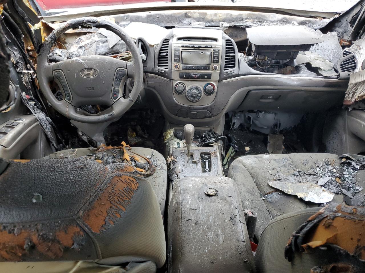 2012 Hyundai Santa Fe VIN 5XYZGDAB2CG151074 Copart auction photo, burn damage thumbnail 8