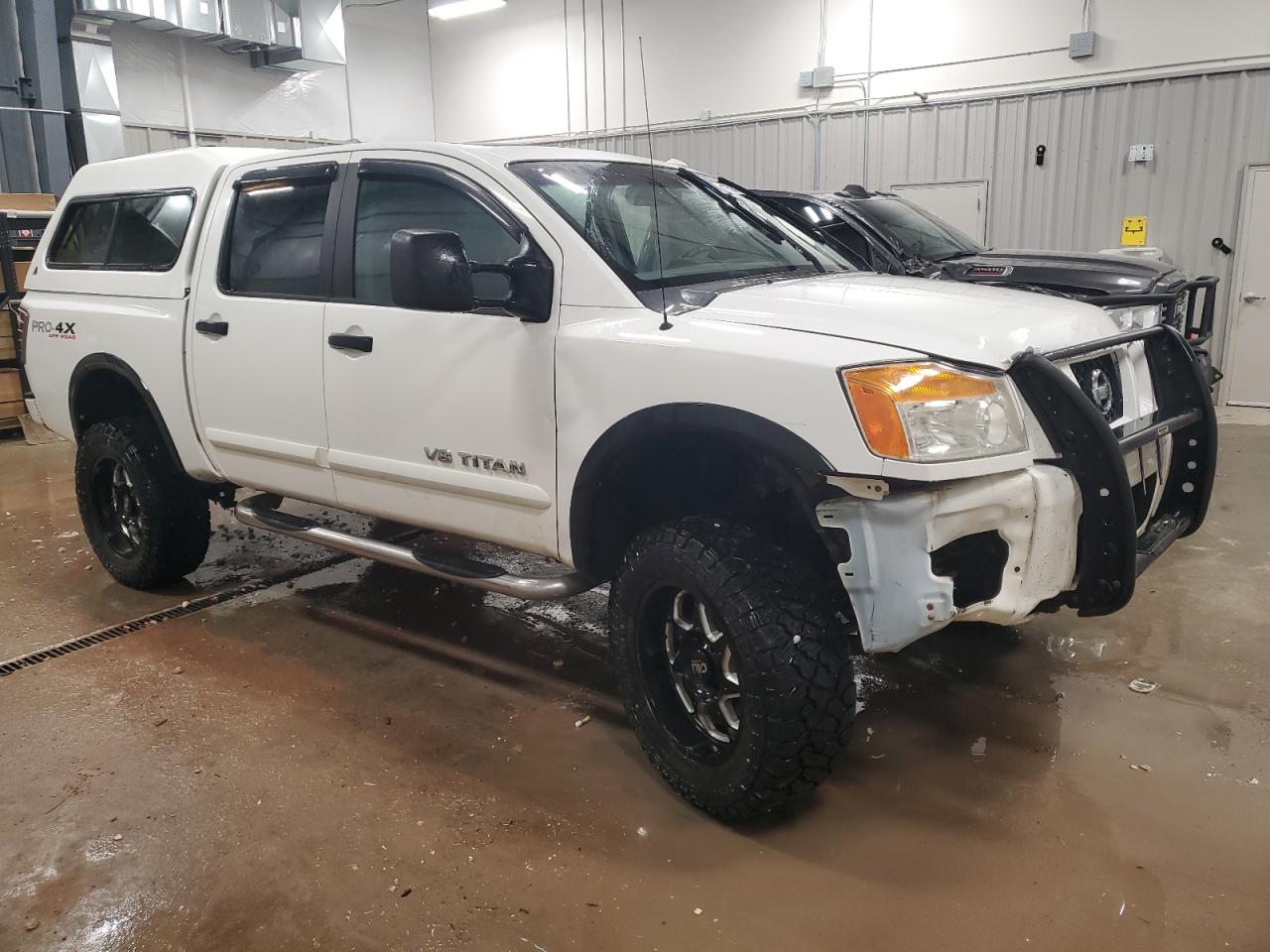 2010 Nissan Titan VIN 1N6BA0EC2AN308717 Copart auction photo, front end damage thumbnail 4