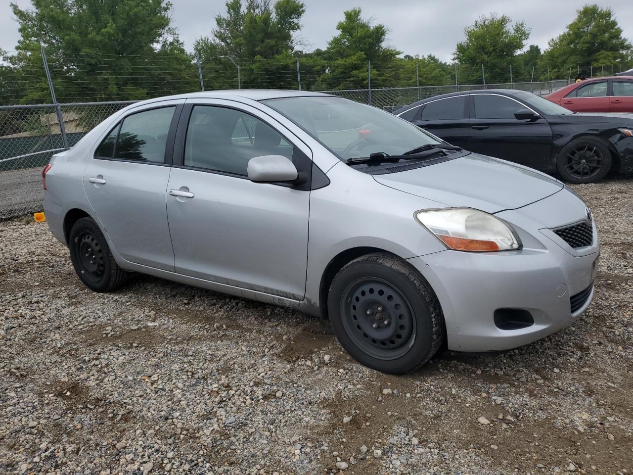 2009 Toyota Yaris VIN JTDBT903291300449 Copart auction photo, side / minor dent/scratches damage thumbnail 4