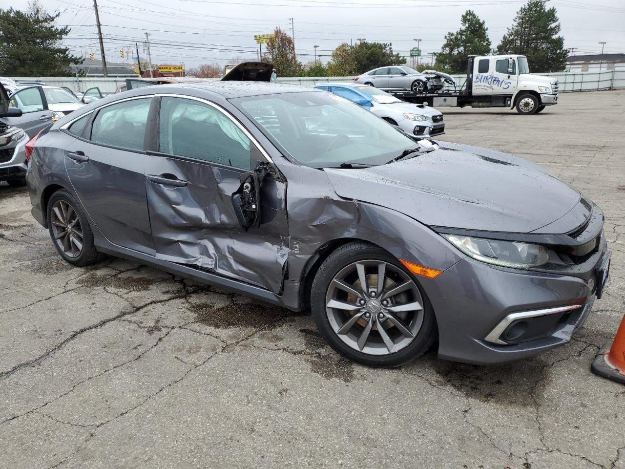 2019 Honda Civic VIN 19XFC1F3XKE209118 Copart auction photo, side / front end damage thumbnail 4