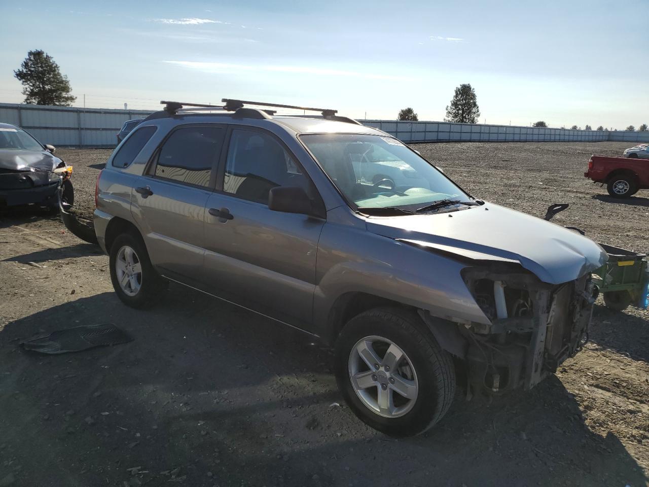 2010 KIA Sportage VIN KNDKGCA34A7695459 Copart auction photo, front end damage thumbnail 4