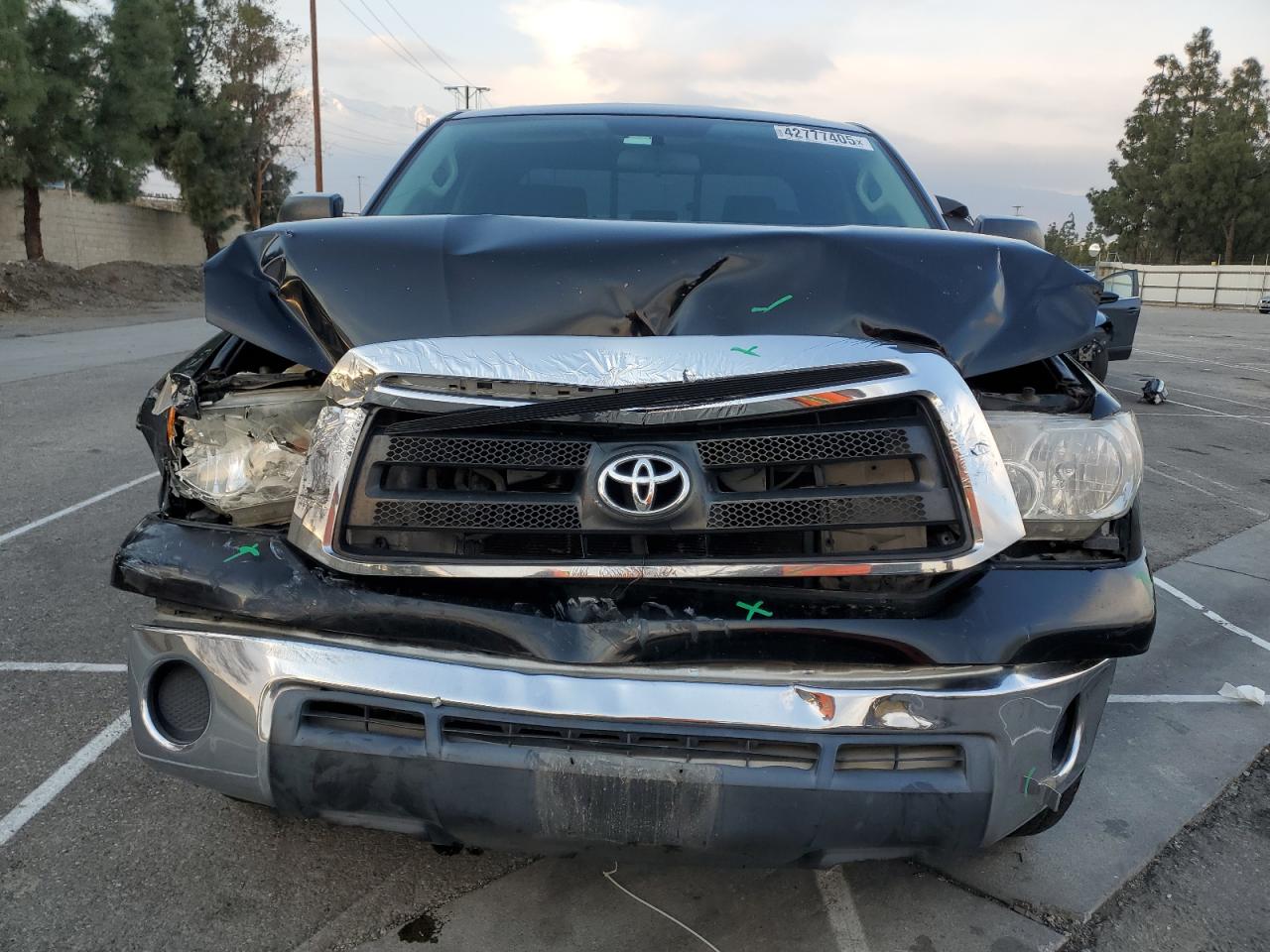 2010 Toyota Tundra VIN 5TFRM5F16AX018715 Copart auction photo, front end damage thumbnail 5