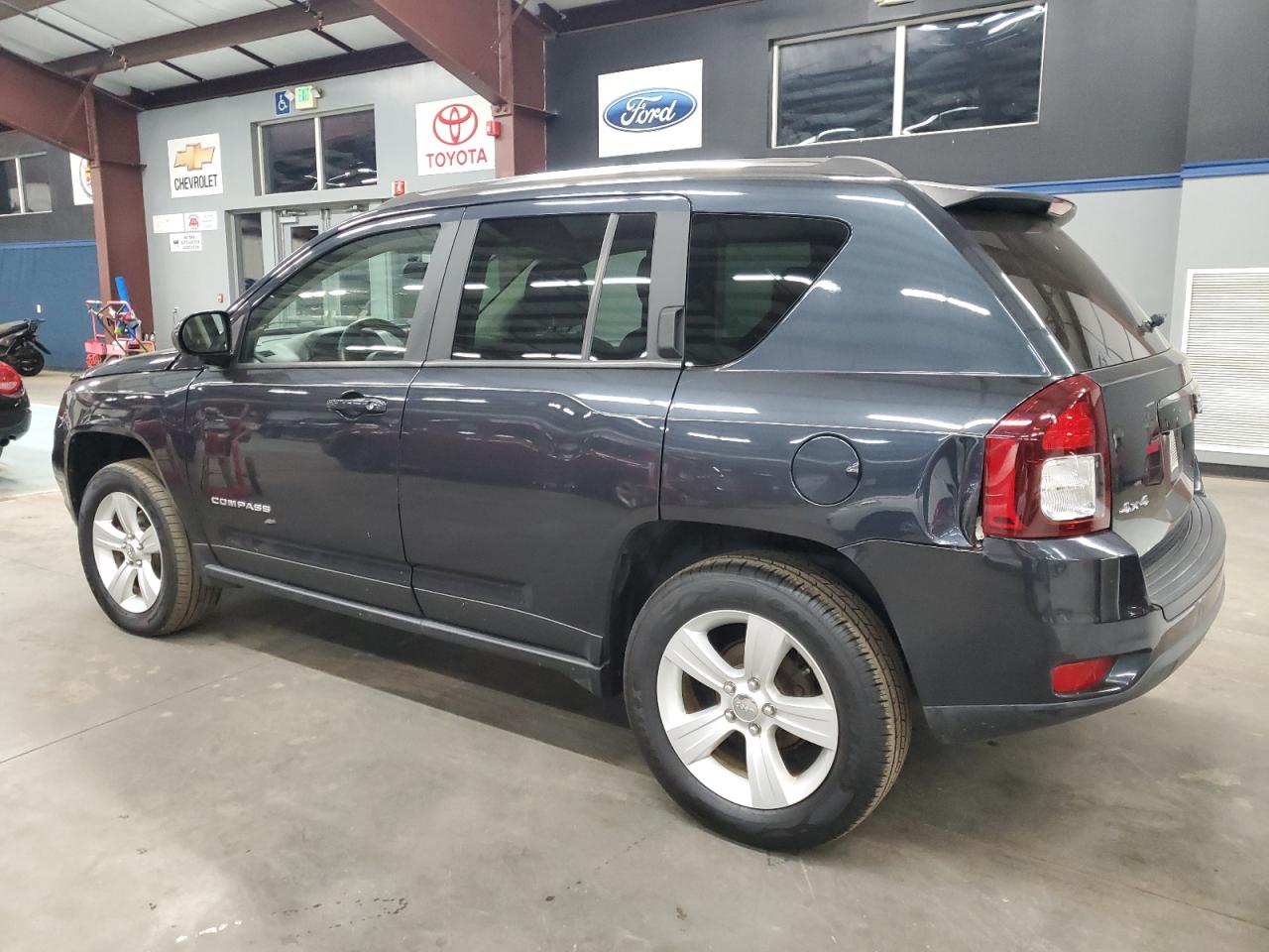 2014 Jeep Compass VIN 1C4NJDBB0ED775231 Copart auction photo, rear end / minor dent/scratches damage thumbnail 2
