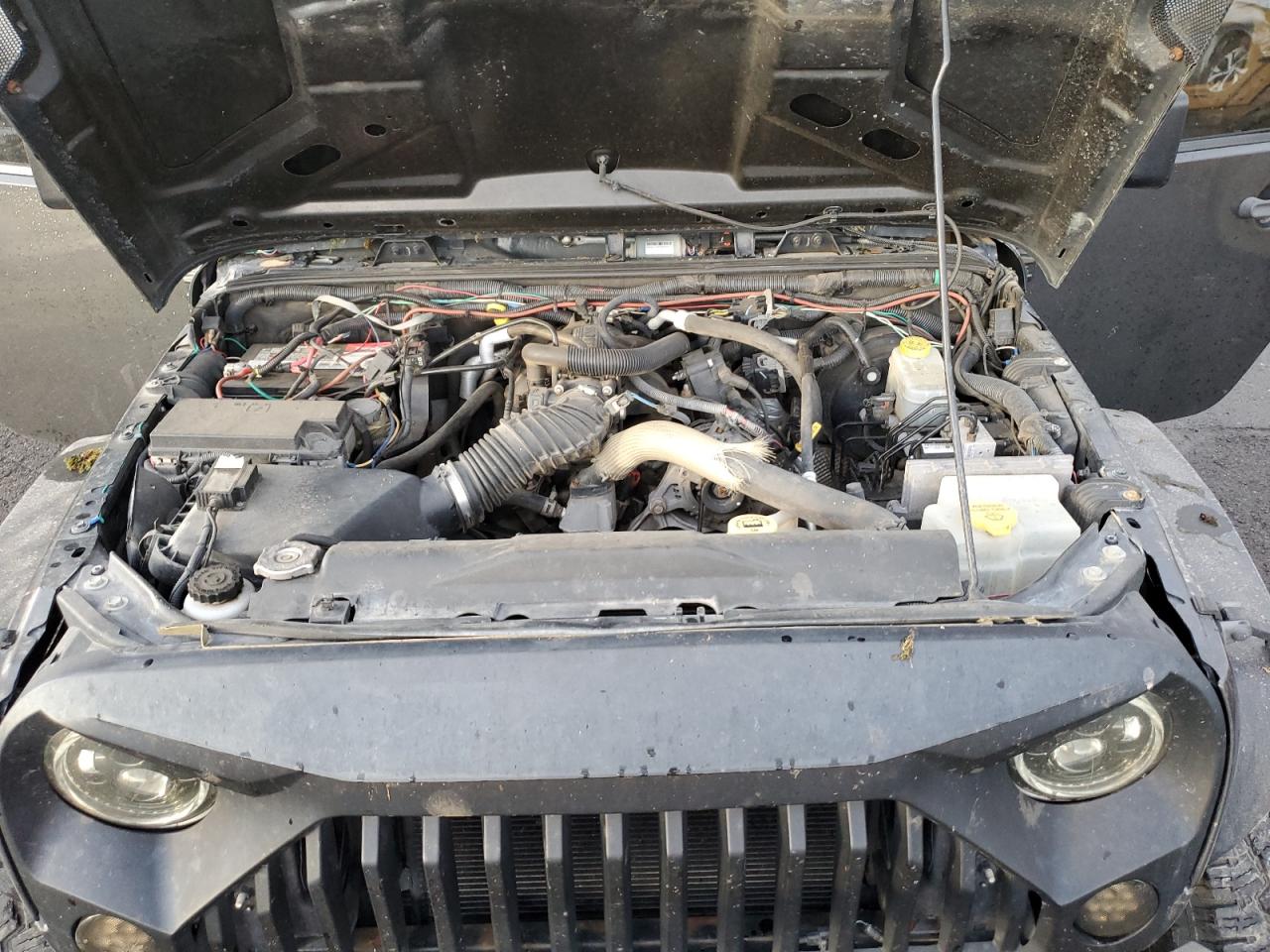 2010 Jeep Wrangler VIN 1J4BA5H12AL137922 Copart auction photo, rear end / top/roof damage thumbnail 13
