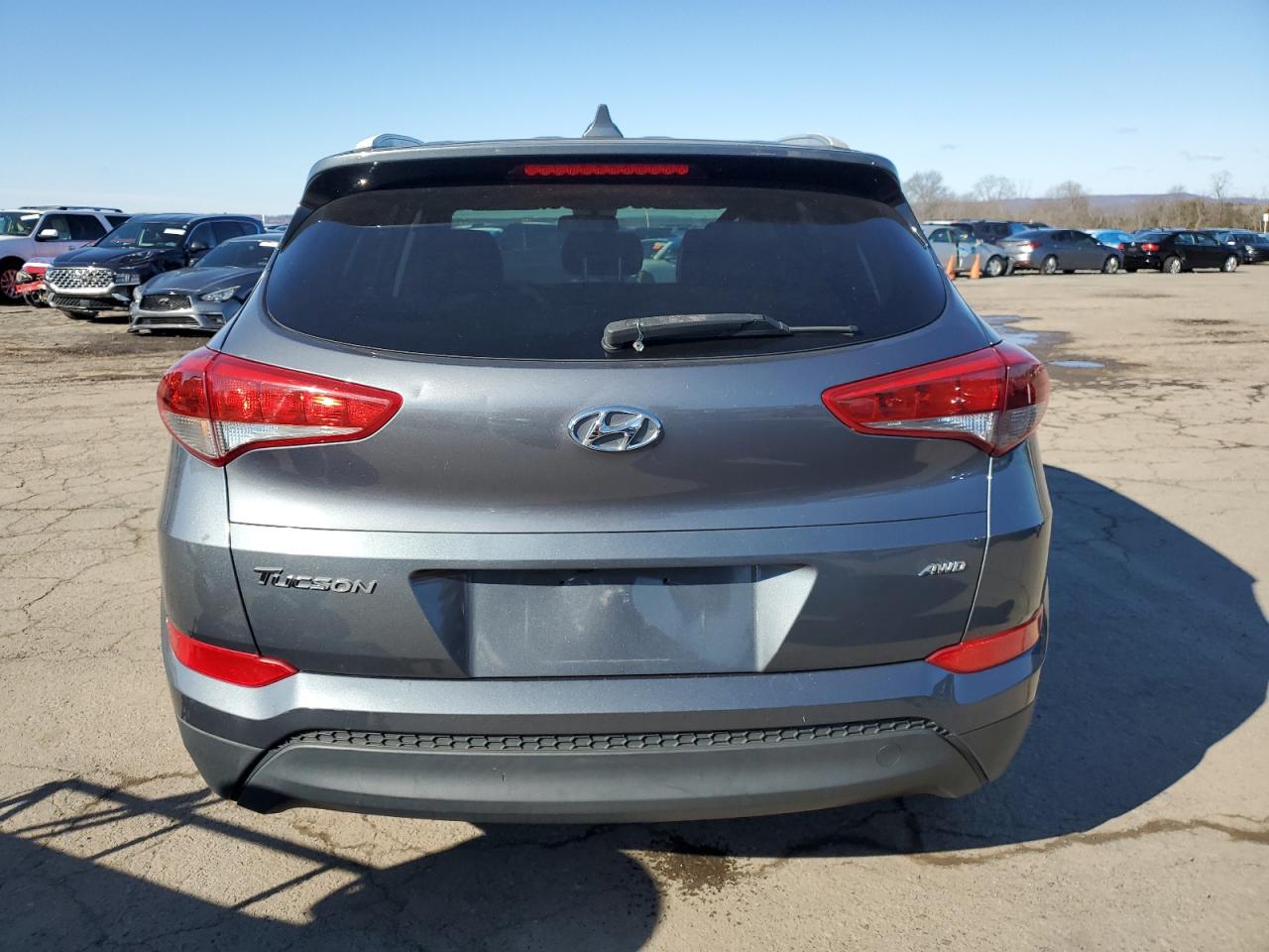 2018 Hyundai Tucson VIN KM8J3CA40JU679837 Copart auction photo, side / rear end damage thumbnail 6