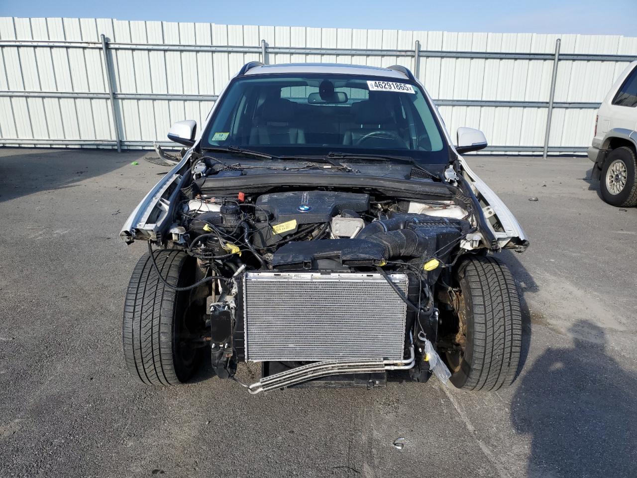 2014 BMW X1 VIN WBAVL1C56EVY20097 Copart auction photo, front end / minor dent/scratches damage thumbnail 5
