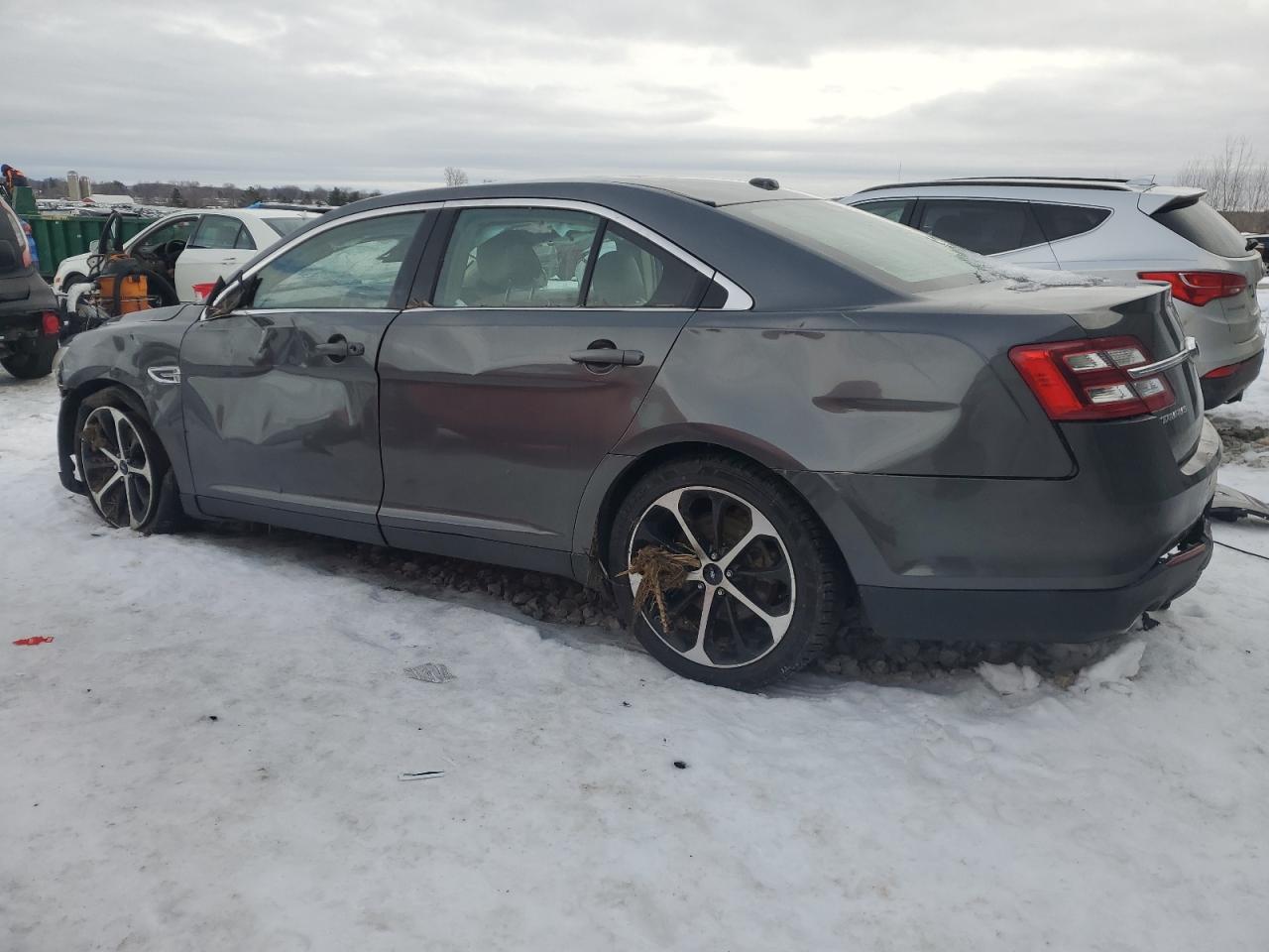 2015 Ford Taurus VIN 1FAHP2J82FG106728 Copart auction photo, rollover damage thumbnail 2