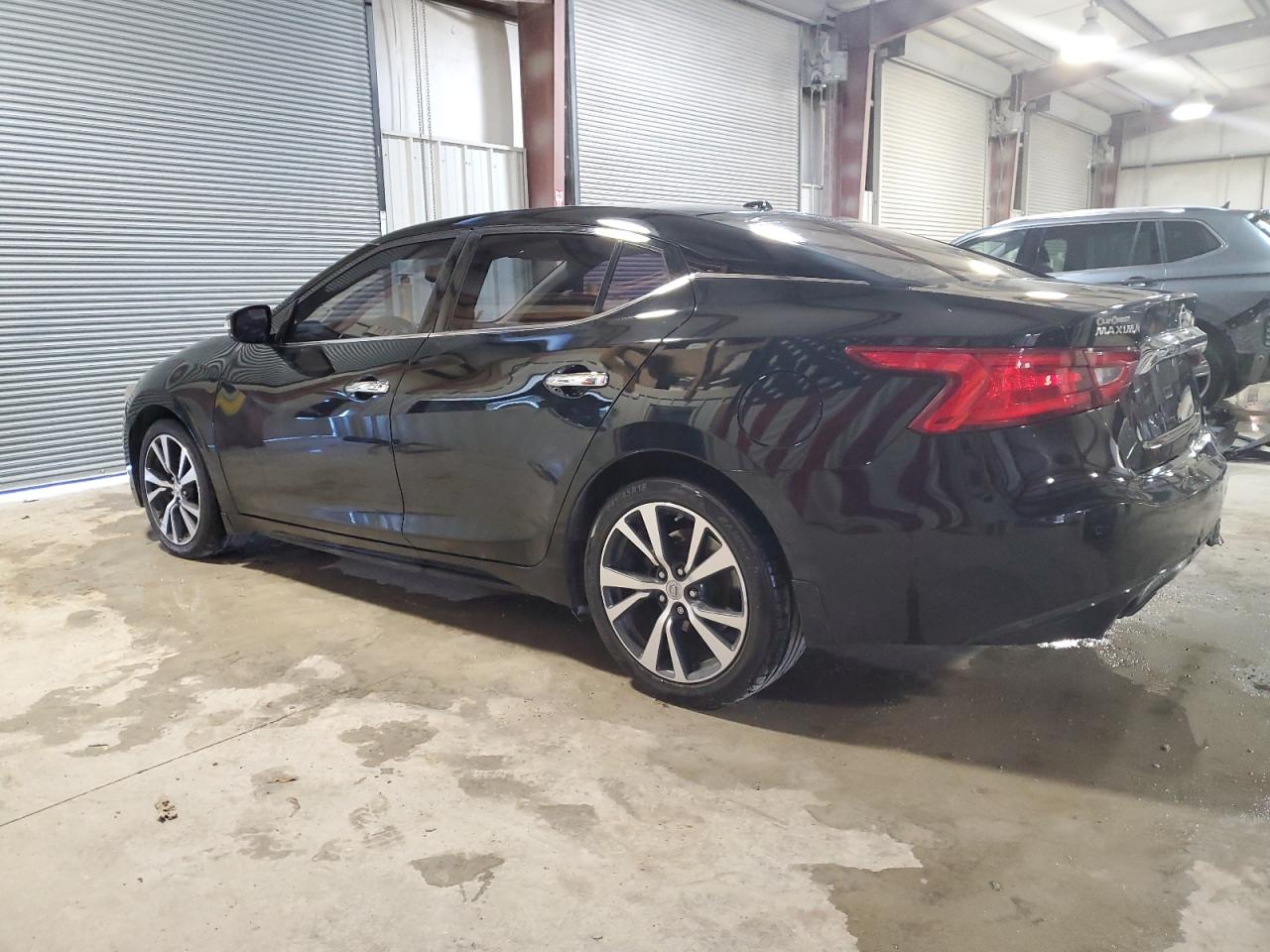 2017 Nissan Maxima VIN 1N4AA6AP1HC412332 Copart auction photo, rear end / minor dent/scratches damage thumbnail 2