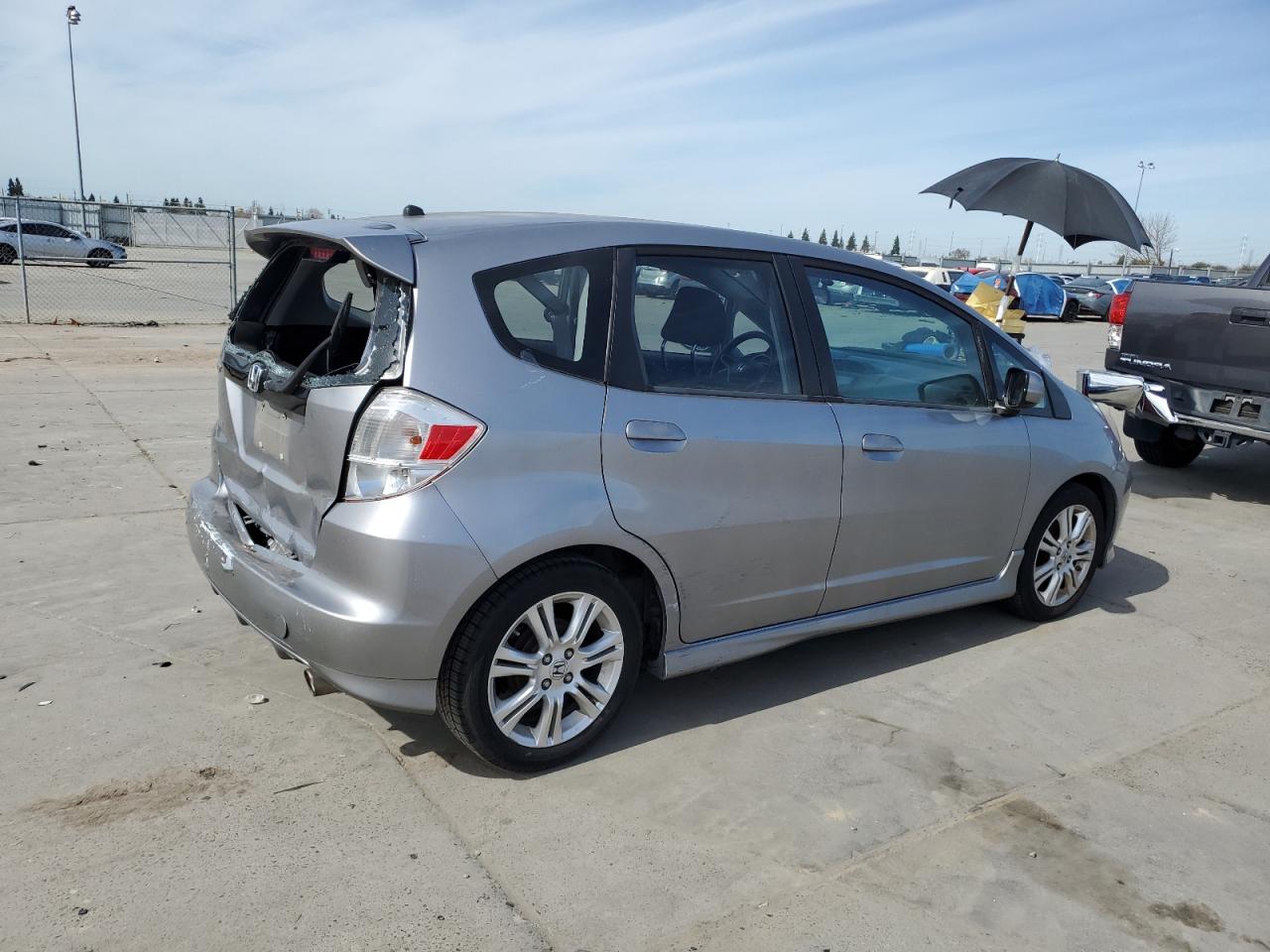 2009 Honda Fit VIN JHMGE88409S001770 Copart auction photo, rear end damage thumbnail 3