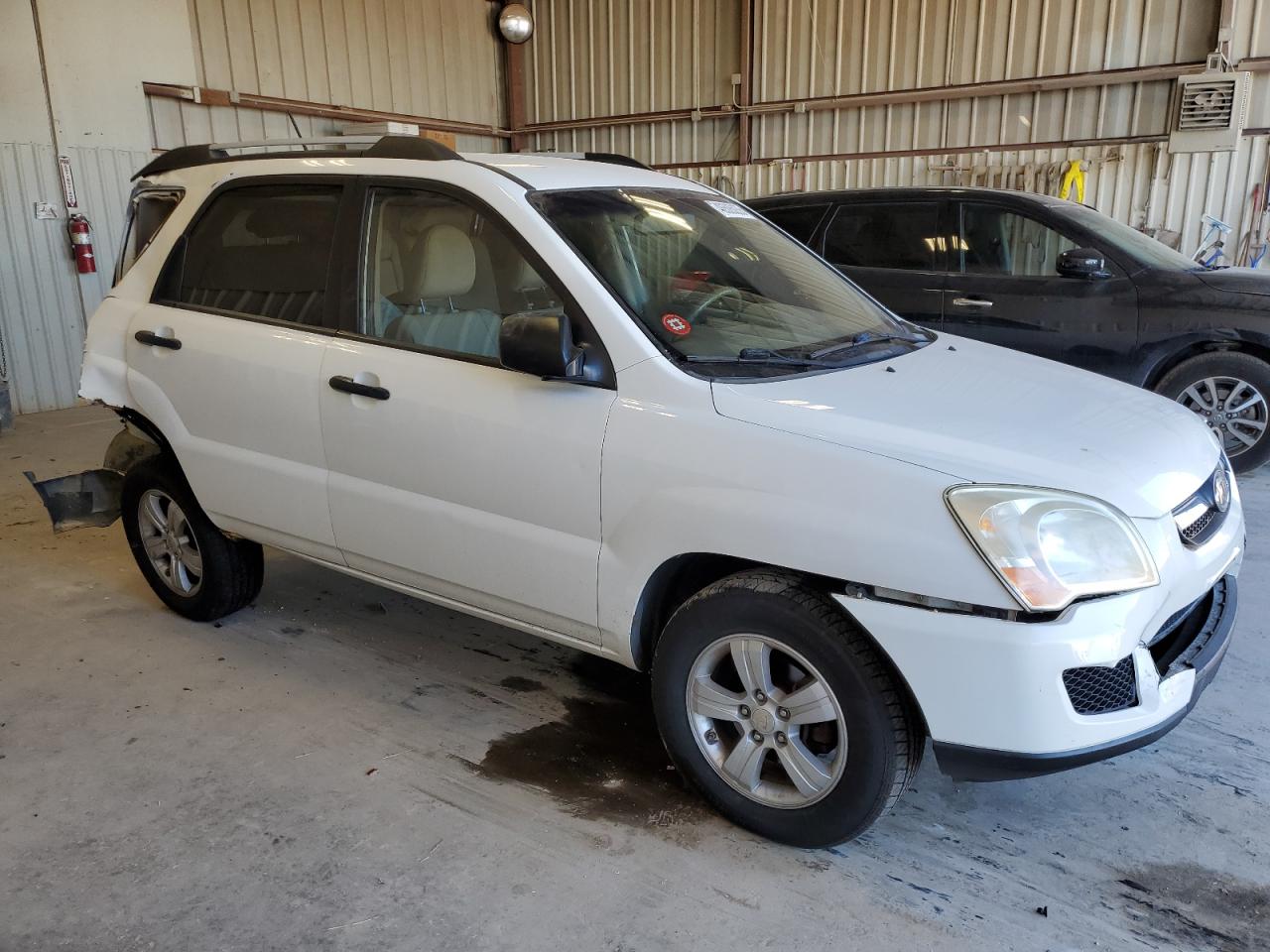 2009 KIA Sportage VIN KNDJF724297574552 Copart auction photo, rear end / undercarriage damage thumbnail 4