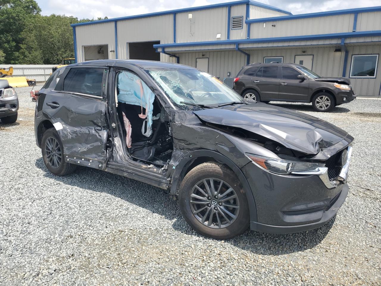 2020 Mazda CX-5 VIN JM3KFACM9L1783952 Copart auction photo, all over damage thumbnail 4