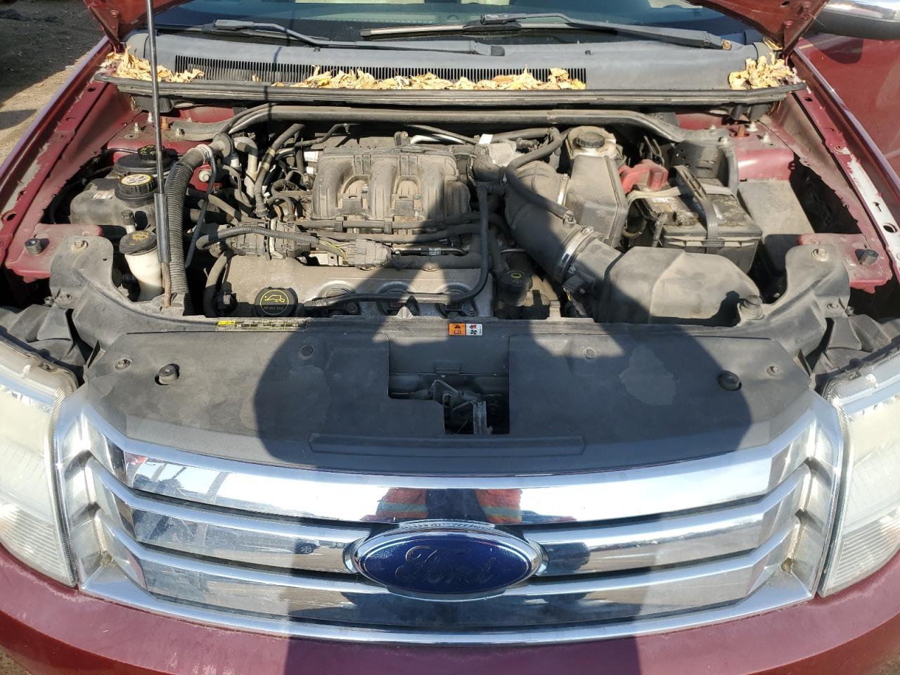 2008 Ford Taurus VIN 1FMDK03W68GA10199 Copart auction photo, side / top/roof damage thumbnail 12