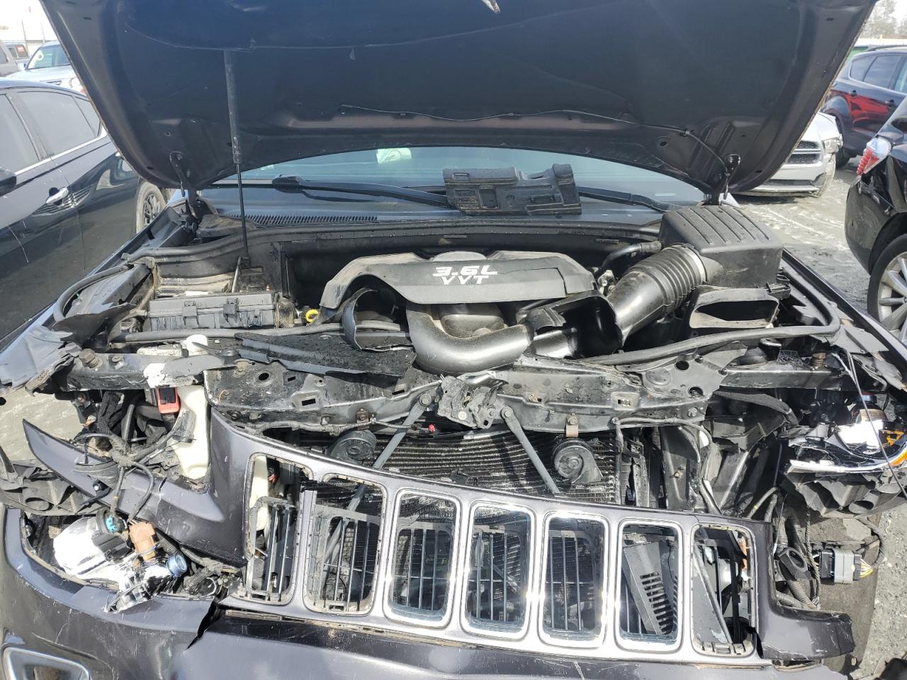 2014 Jeep Grand Cherokee VIN 1C4RJFAG5EC135080 Copart auction photo, front end damage thumbnail 12