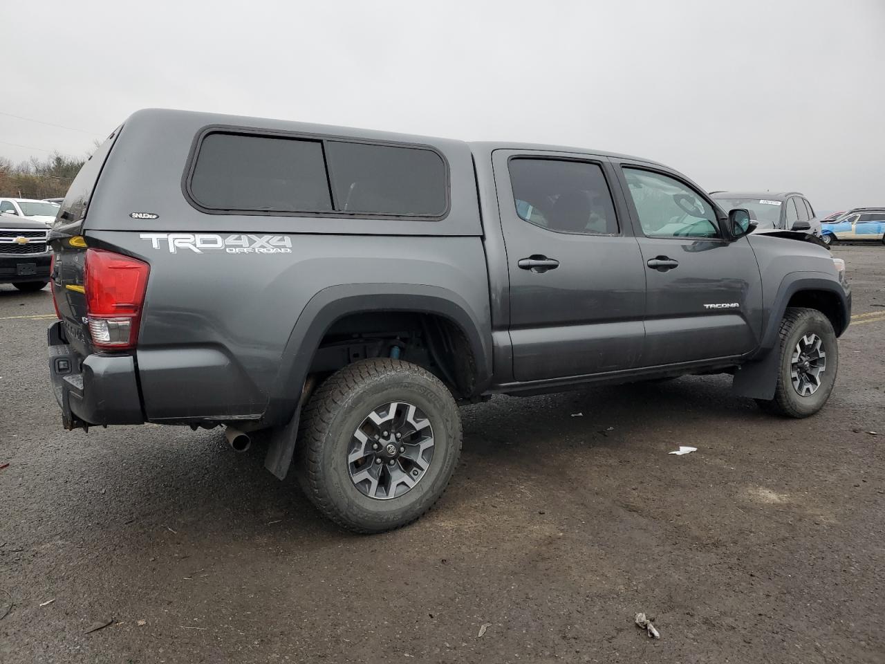2016 Toyota Tacoma VIN 3TMCZ5ANXGM030270 Copart auction photo, front end / rear end damage thumbnail 3