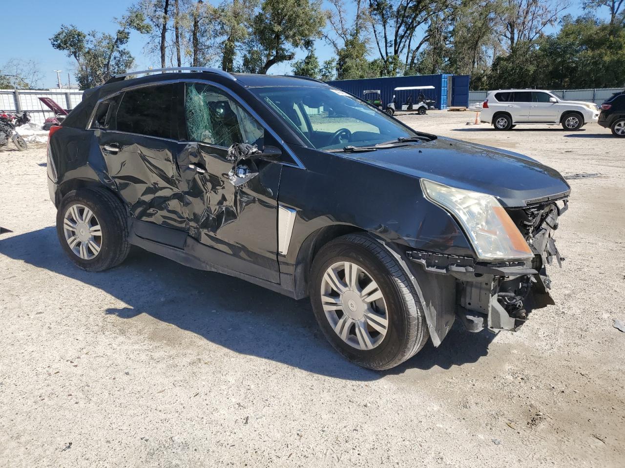 2016 Cadillac SRX VIN 3GYFNBE32GS571996 Copart auction photo, all over damage thumbnail 4