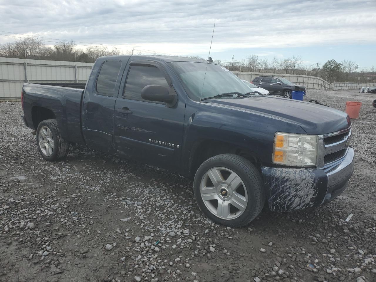 2007 Chevrolet Silverado VIN 2GCEC19C471711246 Copart auction photo, side damage thumbnail 4