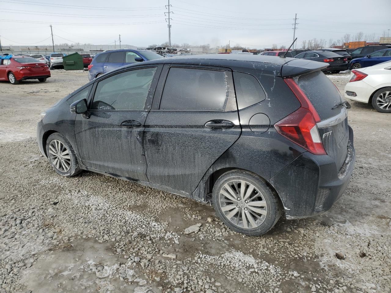 2015 Honda Fit VIN 3HGGK5H88FM769899 Copart auction photo, side / front end damage thumbnail 2