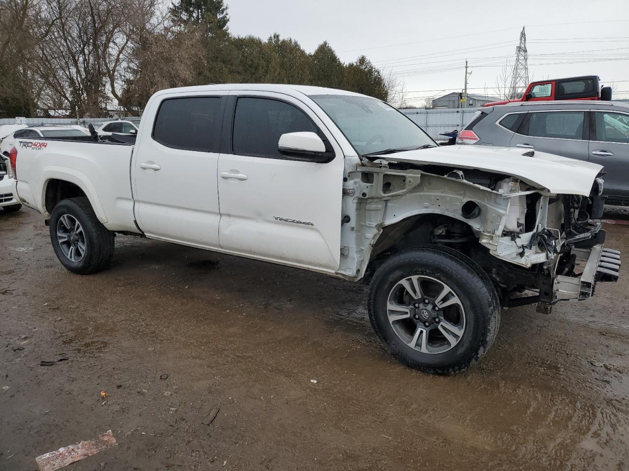 2018 Toyota Tacoma VIN 5TFDZ5BN1JX029755 Copart auction photo, front end / side damage thumbnail 4