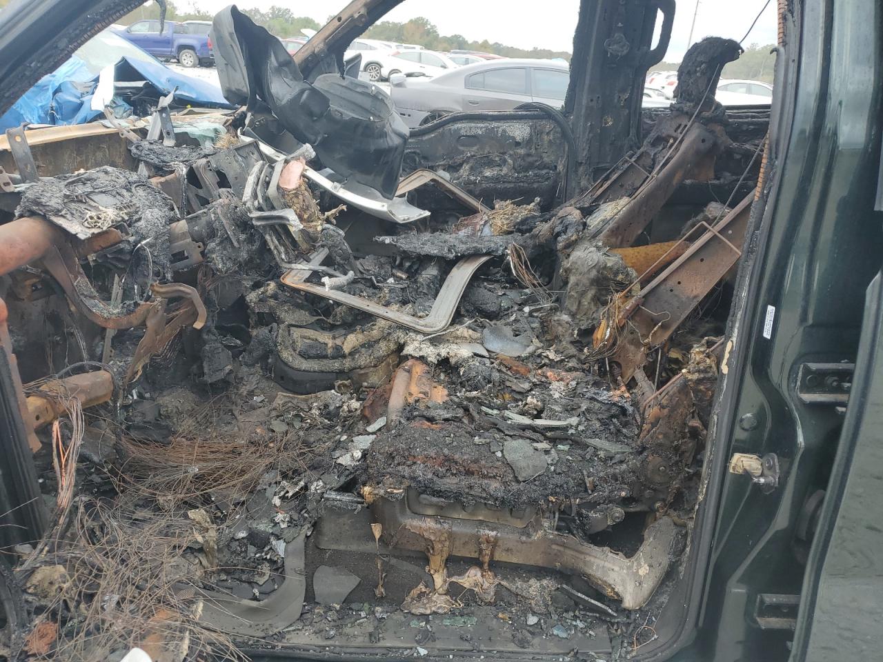 2012 Ford F-150 VIN 1FTFW1CF4CFC16921 Copart auction photo, burn damage thumbnail 7