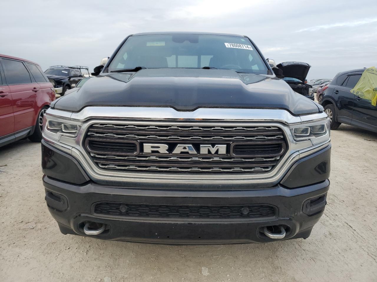 2019 RAM 1500 VIN 1C6SRFPT4KN599824 Copart auction photo, water/flood damage thumbnail 5