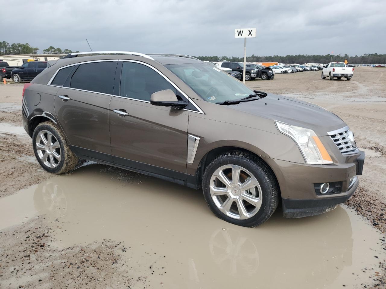 2016 Cadillac SRX VIN 3GYFNDE34GS580596 Copart auction photo, mechanical / minor dent/scratches damage thumbnail 3