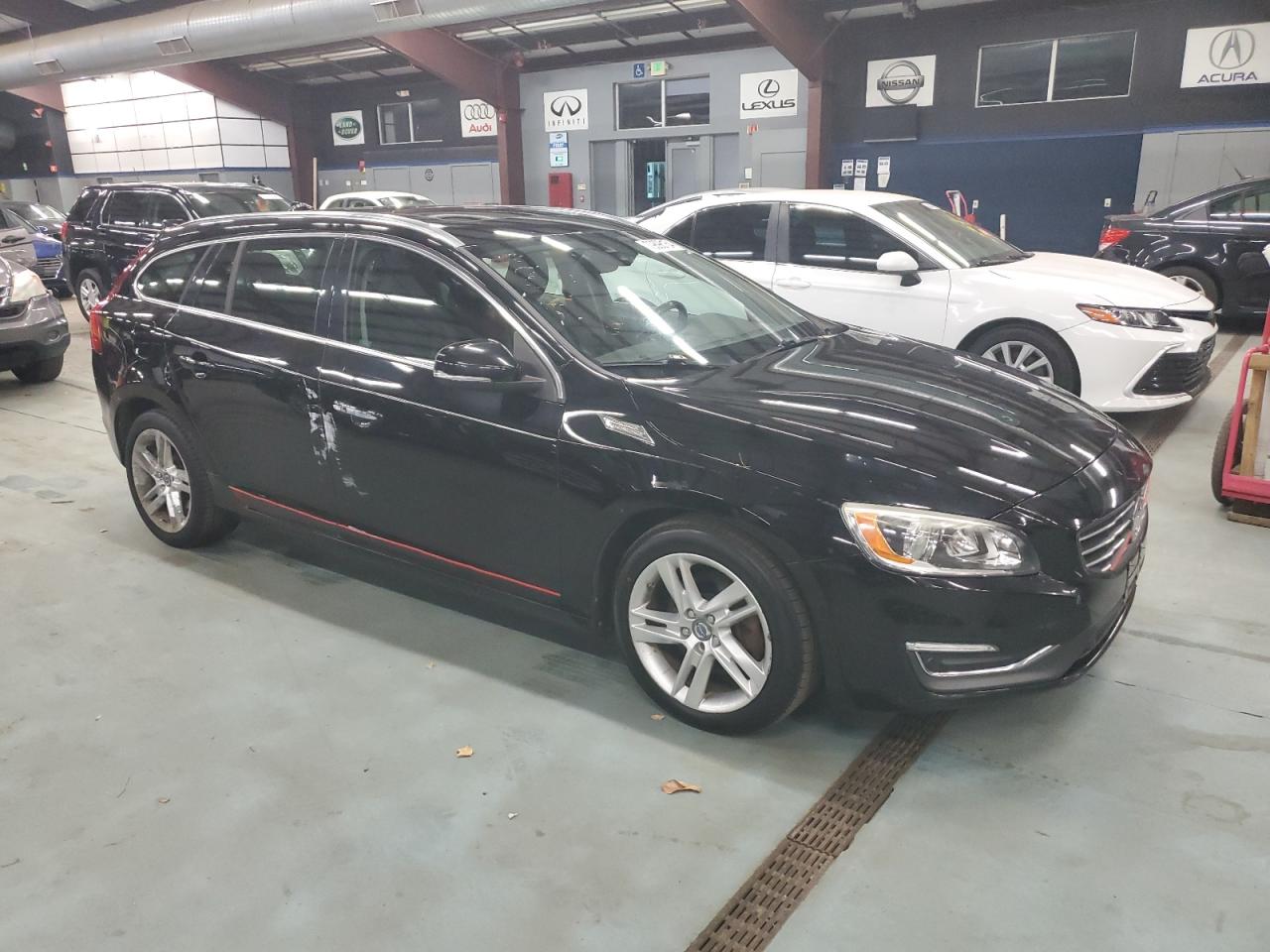 2015 Volvo V60 VIN YV140MEK4F1217700 Copart auction photo, side / minor dent/scratches damage thumbnail 4
