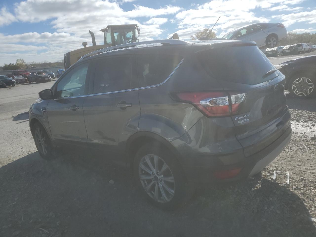 2017 Ford Escape VIN 1FMCU9JD4HUE69597 Copart auction photo, side damage thumbnail 2