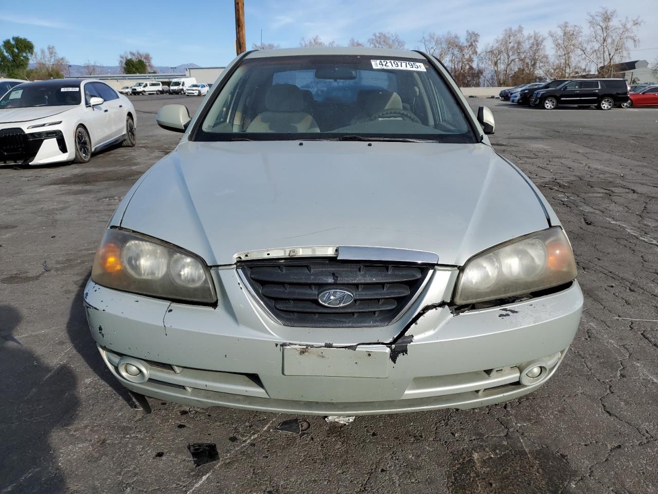 2004 Hyundai Elantra VIN KMHDN46DX4U909524 Copart auction photo, side / front end damage thumbnail 5