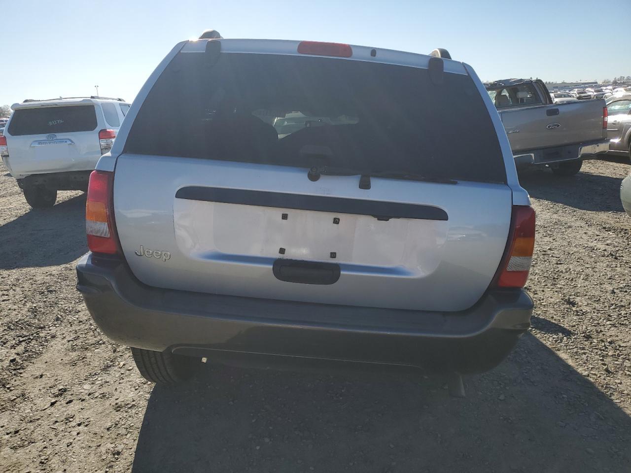 2004 Jeep Grand Cherokee VIN 1J4GX48S84C281857 Copart auction photo, front end / undercarriage damage thumbnail 6