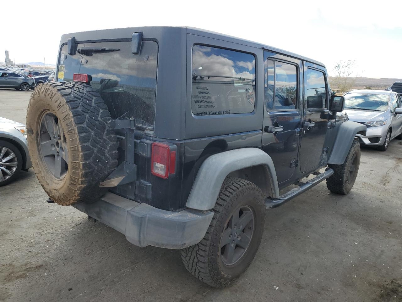 2011 Jeep Wrangler VIN 1J4BA3H19BL523176 Copart auction photo, rear end damage thumbnail 3