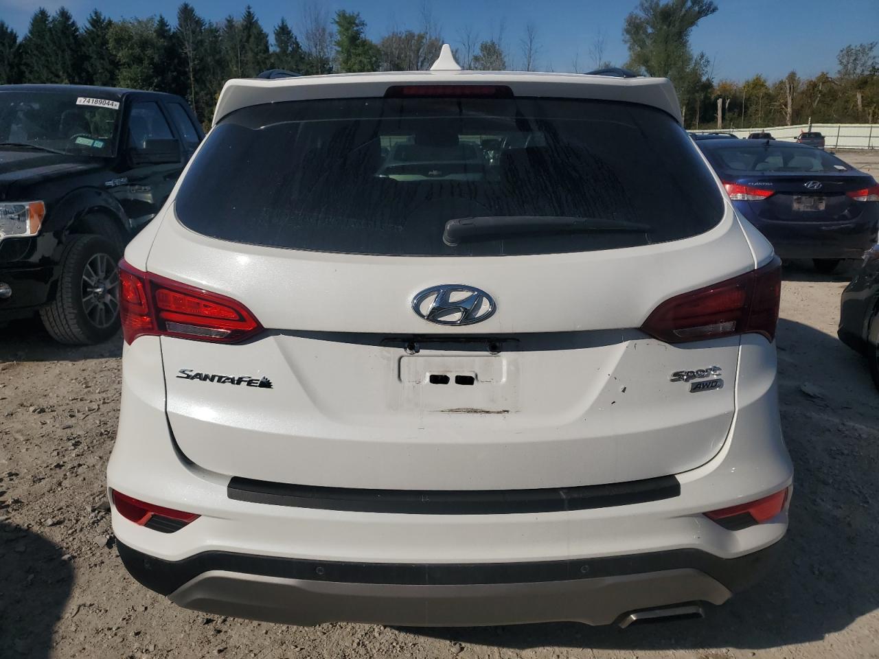 2017 Hyundai Santa Fe VIN 5XYZUDLB2HG460010 Copart auction photo, front end damage thumbnail 6