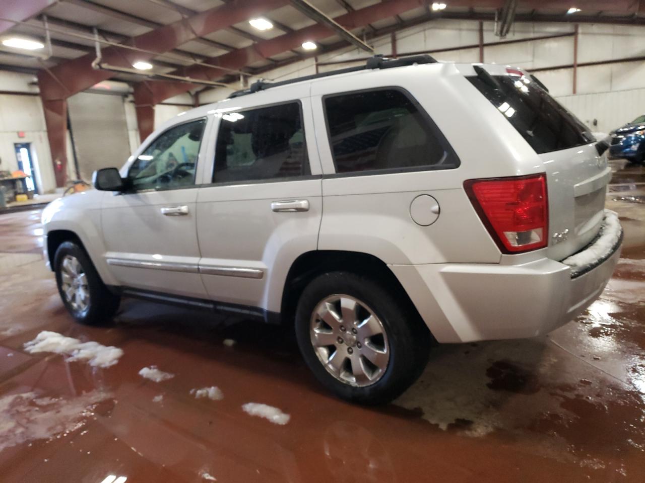 2010 Jeep Grand Cherokee VIN 1J4PR4GKXAC142921 Copart auction photo, front end / side damage thumbnail 2