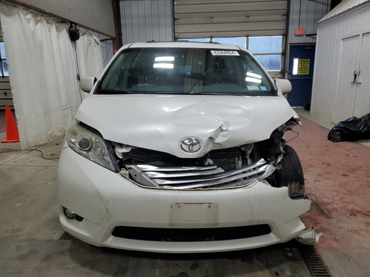2012 Toyota Sienna VIN 5TDDK3DC3CS043587 Copart auction photo, front end damage thumbnail 5