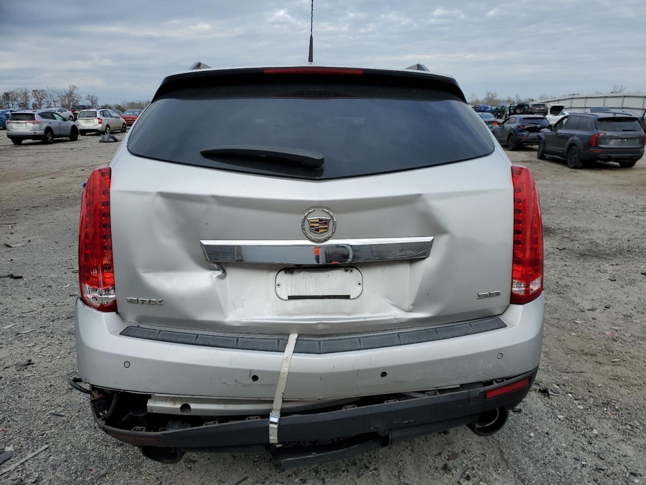 2013 Cadillac SRX VIN 3GYFNCE32DS640042 Copart auction photo, rear end / minor dent/scratches damage thumbnail 6
