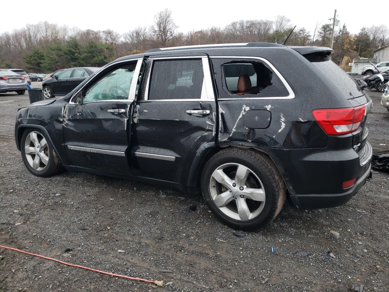 2012 Jeep Grand Cherokee VIN 1C4RJFCT5CC310676 Copart auction photo, all over / undercarriage damage thumbnail 2