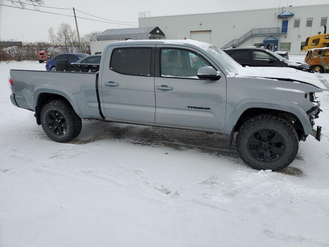 2021 Toyota Tacoma VIN 5TFDZ5BN5MX057899 Copart auction photo, front end / rear end damage thumbnail 4