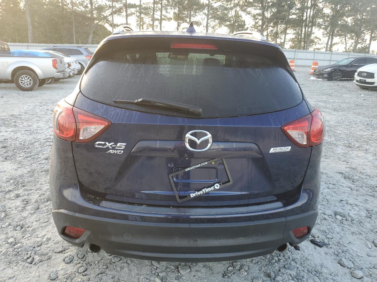 2014 Mazda CX-5 VIN JM3KE4DY7E0312493 Copart auction photo, side / front end damage thumbnail 6