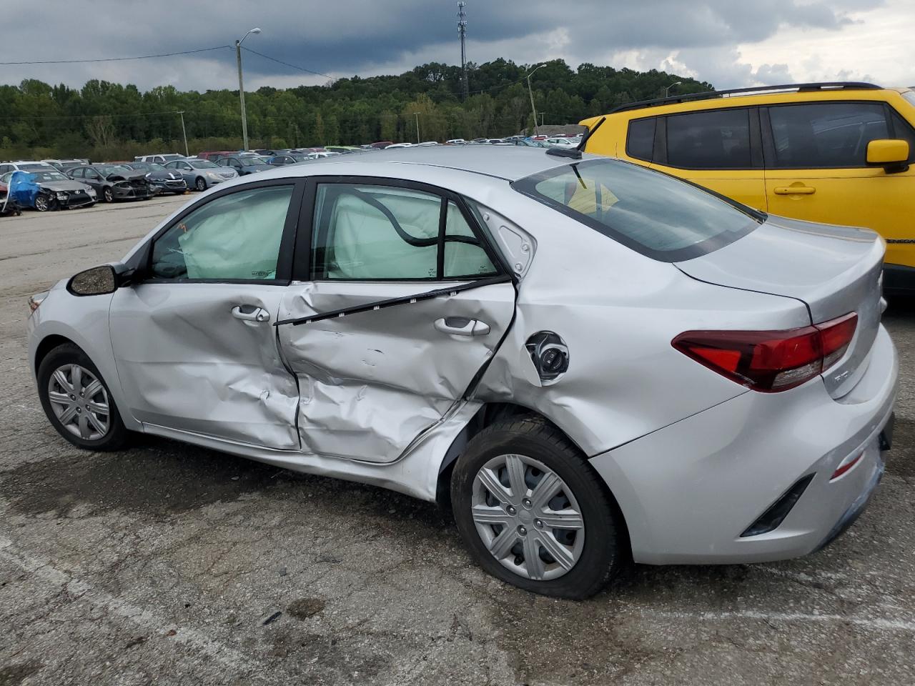2023 KIA Rio VIN 3KPA24AD1PE555175 Copart auction photo, undercarriage / side damage thumbnail 2