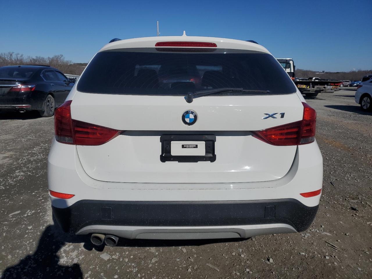 2015 BMW X1 VIN WBAVM1C50FV316336 Copart auction photo, side / minor dent/scratches damage thumbnail 6