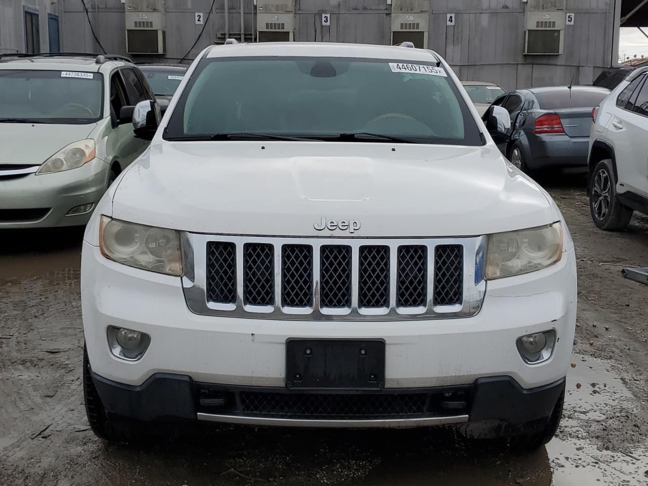 2013 Jeep Grand Cherokee VIN 1C4RJFCT8DC525423 Copart auction photo, vandalism damage thumbnail 5