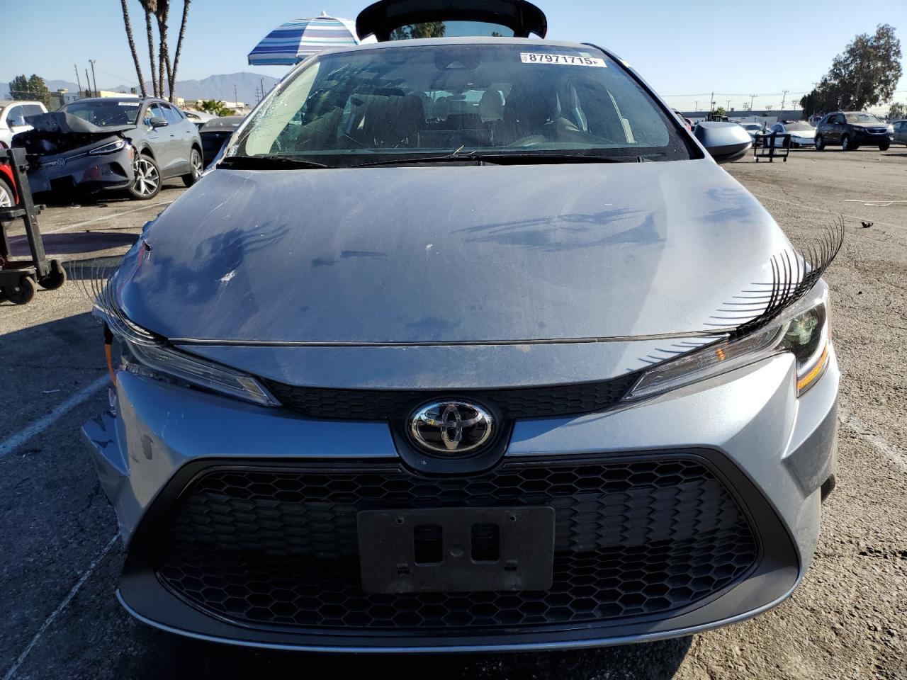 2021 Toyota Corolla VIN 5YFEPMAE5MP222841 Copart auction photo, front end / side damage thumbnail 5