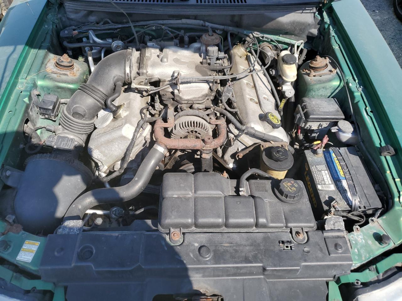 1999 Ford Mustang VIN 1FAFP46V7XF180624 Copart auction photo, water/flood damage thumbnail 11
