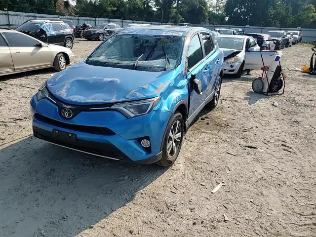 2018 Toyota RAV 4 VIN 2T3WFREV9JW484457 Copart auction photo, all over damage thumbnail 10