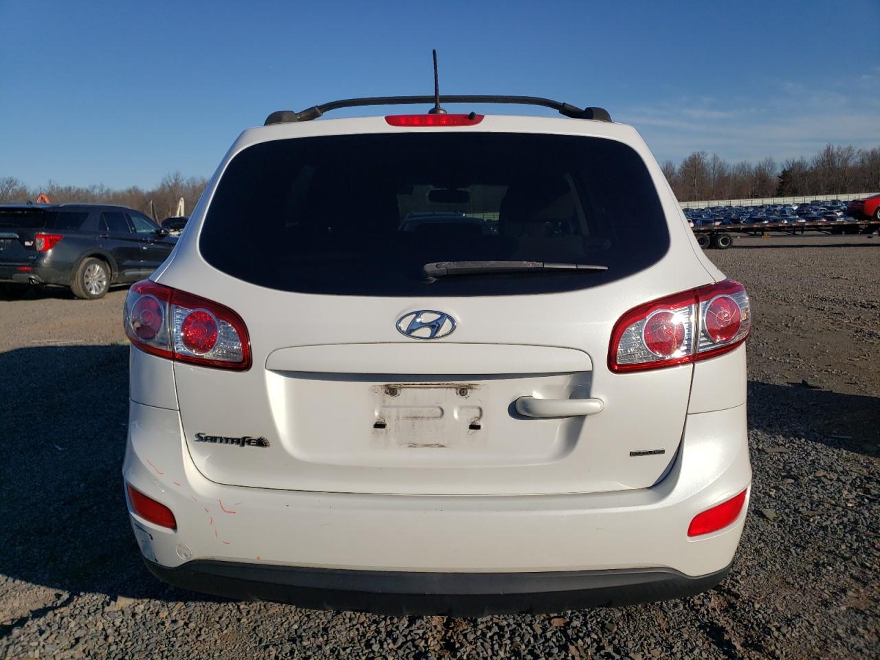 2012 Hyundai Santa Fe VIN 5XYZGDAB0CG099816 Copart auction photo, minor dent/scratches damage thumbnail 6