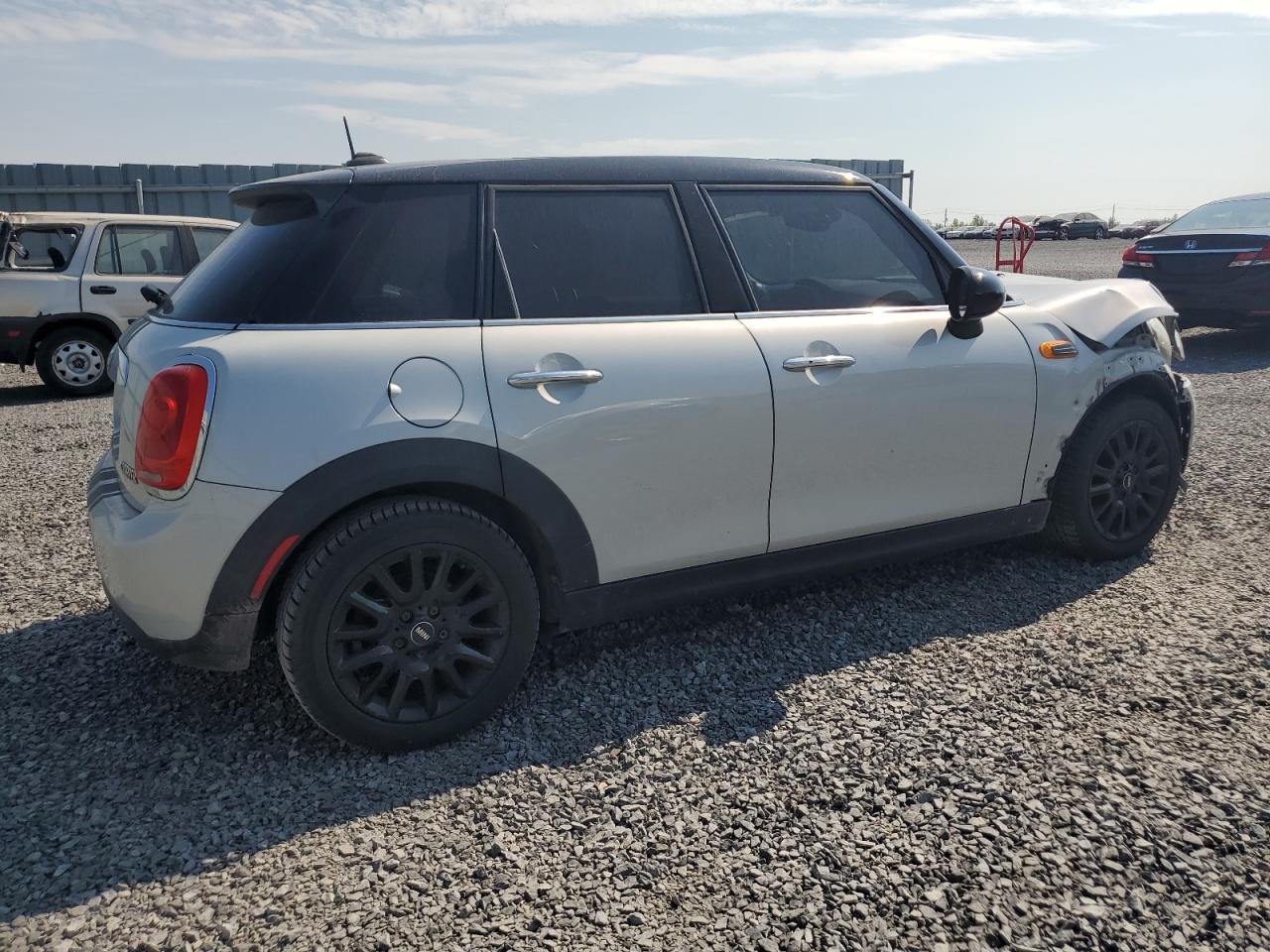 2015 MINI Cooper VIN WMWXS5C53FT831557 Copart auction photo, front end / minor dent/scratches damage thumbnail 3