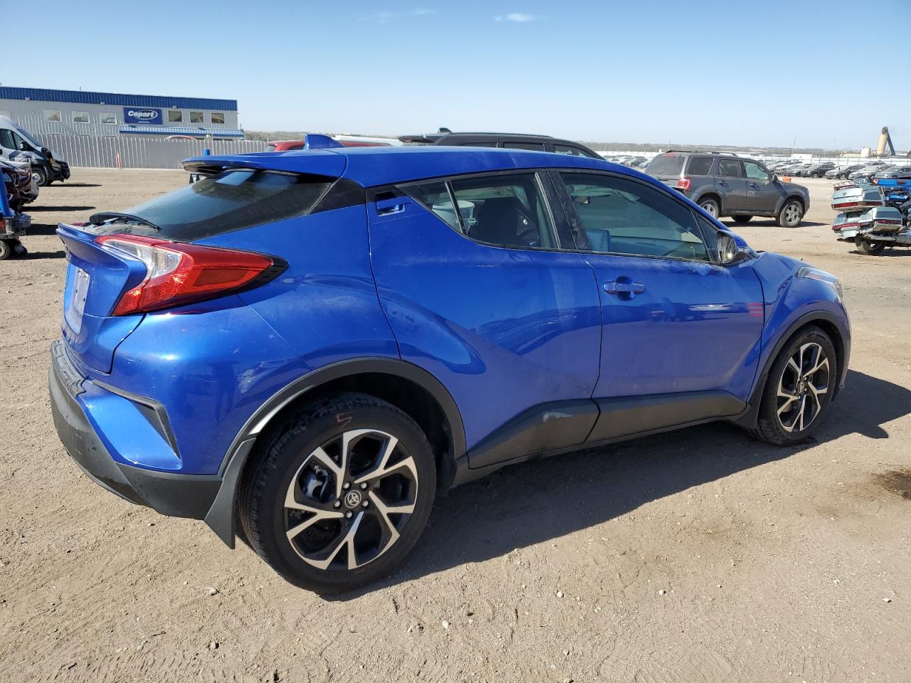 2021 Toyota C-HR VIN JTNKHMBX8M1108235 Copart auction photo, side / front end damage thumbnail 3