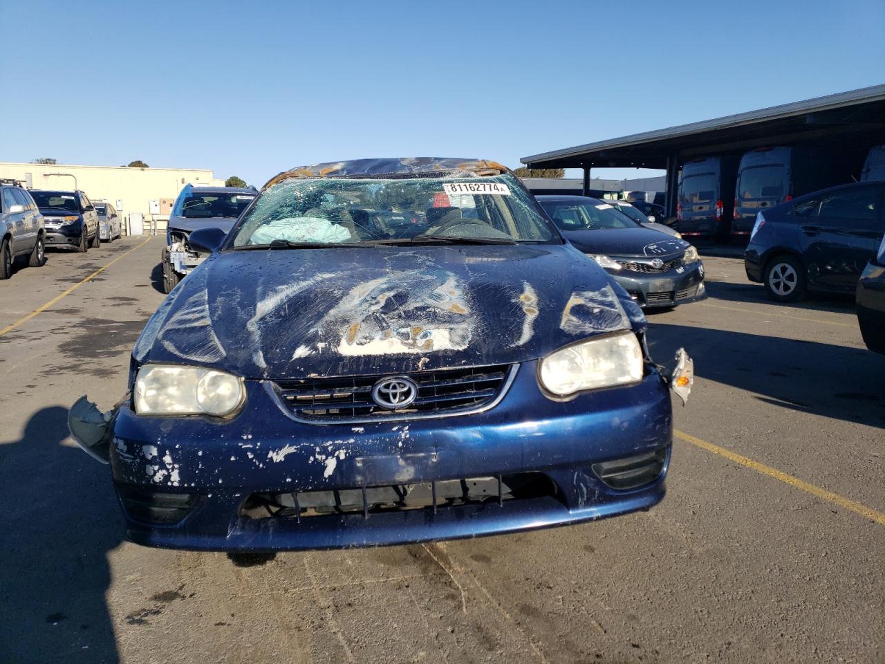 2001 Toyota Corolla VIN 1NXBR12E91Z434520 Copart auction photo, vandalism / rollover damage thumbnail 5
