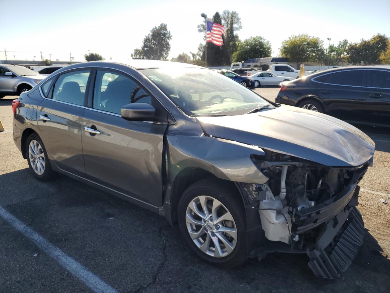 2019 Nissan Sentra VIN 3N1AB7AP4KY404885 Copart auction photo, front end / side damage thumbnail 4